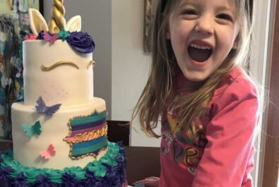 girl with a custom unicorn hat