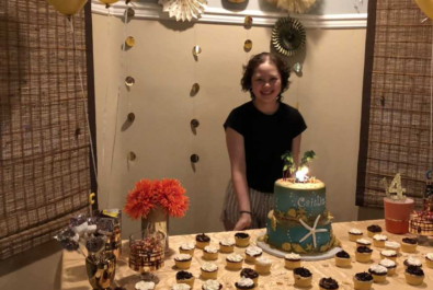 girl at a birthday table