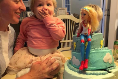 girl and mother with a custom cake