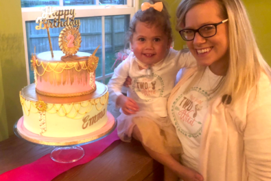 girl and mother with a custom cake