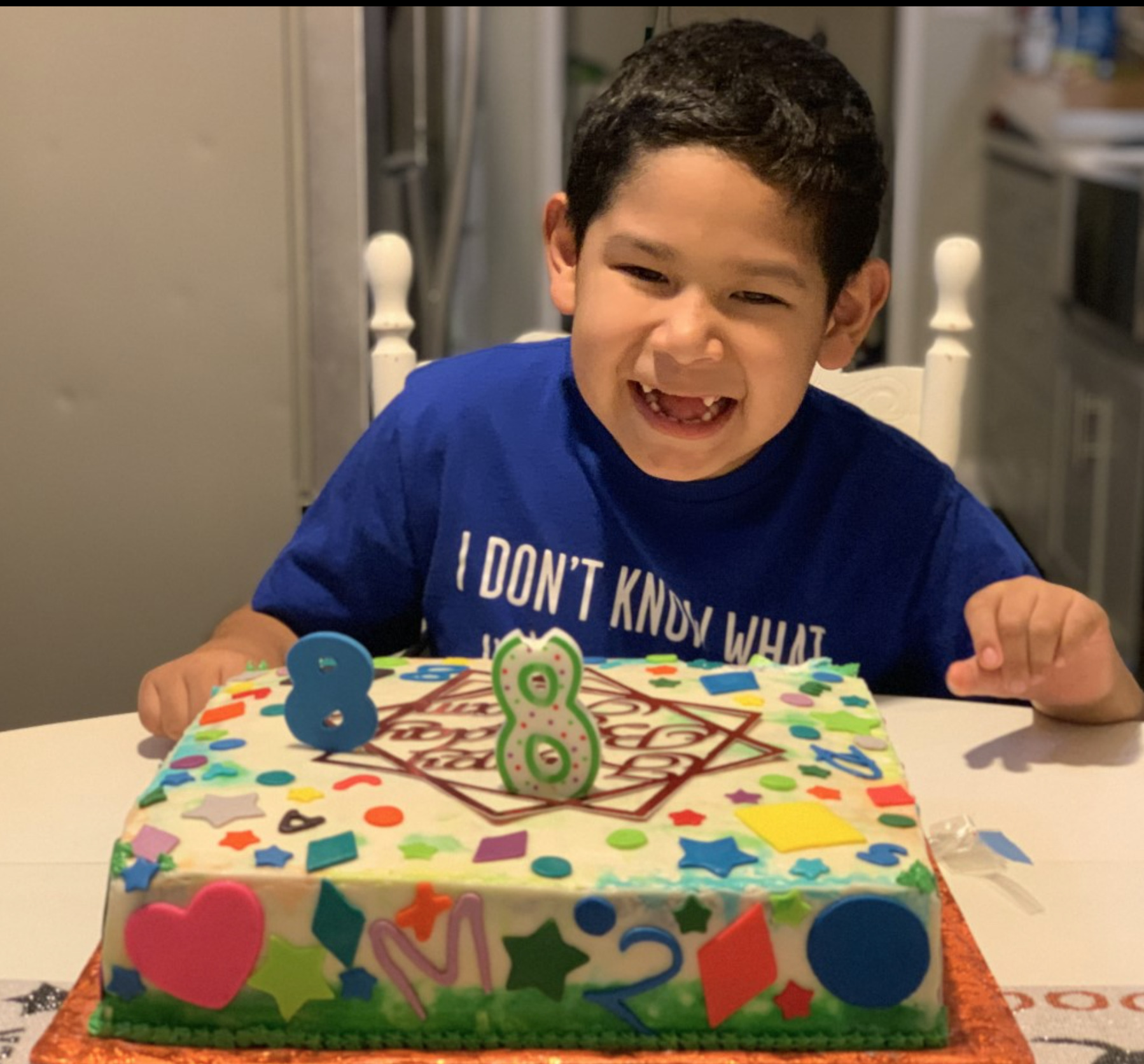 boy with a custom cake